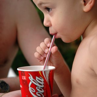 Is Coca-Cola an Alcoholic Drink - Baby Drinking Coca-Cola