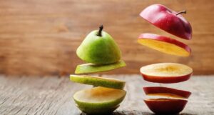flying slices of fruit apple pear PPQXKKK 1 1