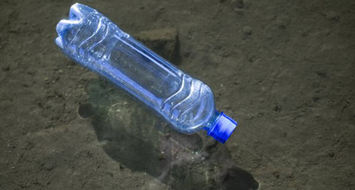 depositphotos 318648276 stock photo plastic waste ocean plastic bottle